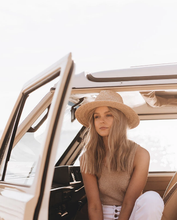 Load image into Gallery viewer, White Female Model Sitting in Ute Wearing The Will &amp; Bear River Sand Hat
